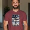 20241211044827-1efb77b2-9a48-6f1a-b005-da0c7f248ade.jpg Dream Bold, Live Fearlessly – Let Your Dreams Be Bigger Than Your Fears Unisex T-shirt