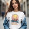 20241217232727-1efbcce7-a373-6786-a5f6-ca73a63ac2dc.jpg Smile, It's Free Therapy Unisex T-shirt β Your Daily Dose of Happiness