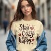20241218022805-1efbce7b-616f-6246-b6db-c20c16e02faa.jpg Stay Cozy, Stay Happy Unisex T-shirt – Life is Better When You're Cozy