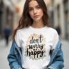 20241218035346-1efbcf3a-e9fa-6272-9ecd-ae9213ee439b.jpg Don’t Worry, Be Happy Unisex T-shirt – Wear Your Joy